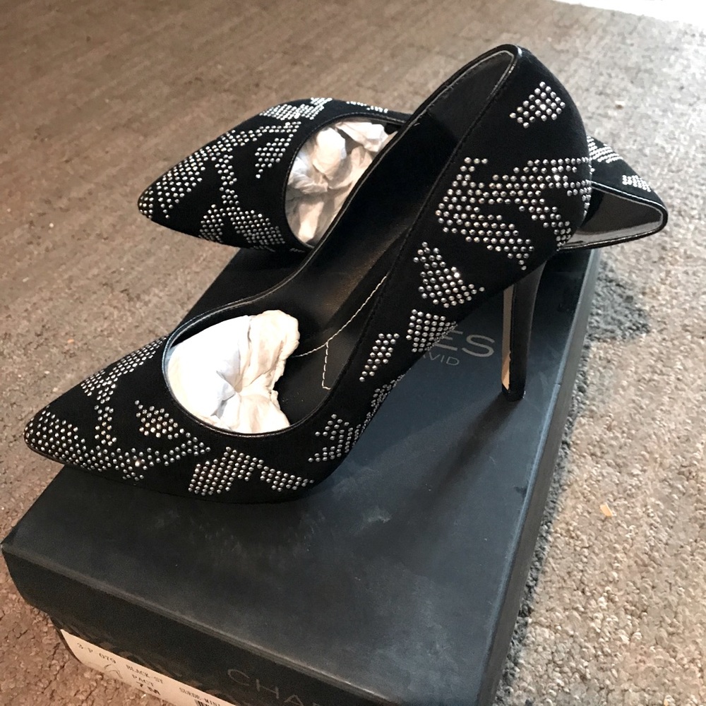 New black and silver pumps